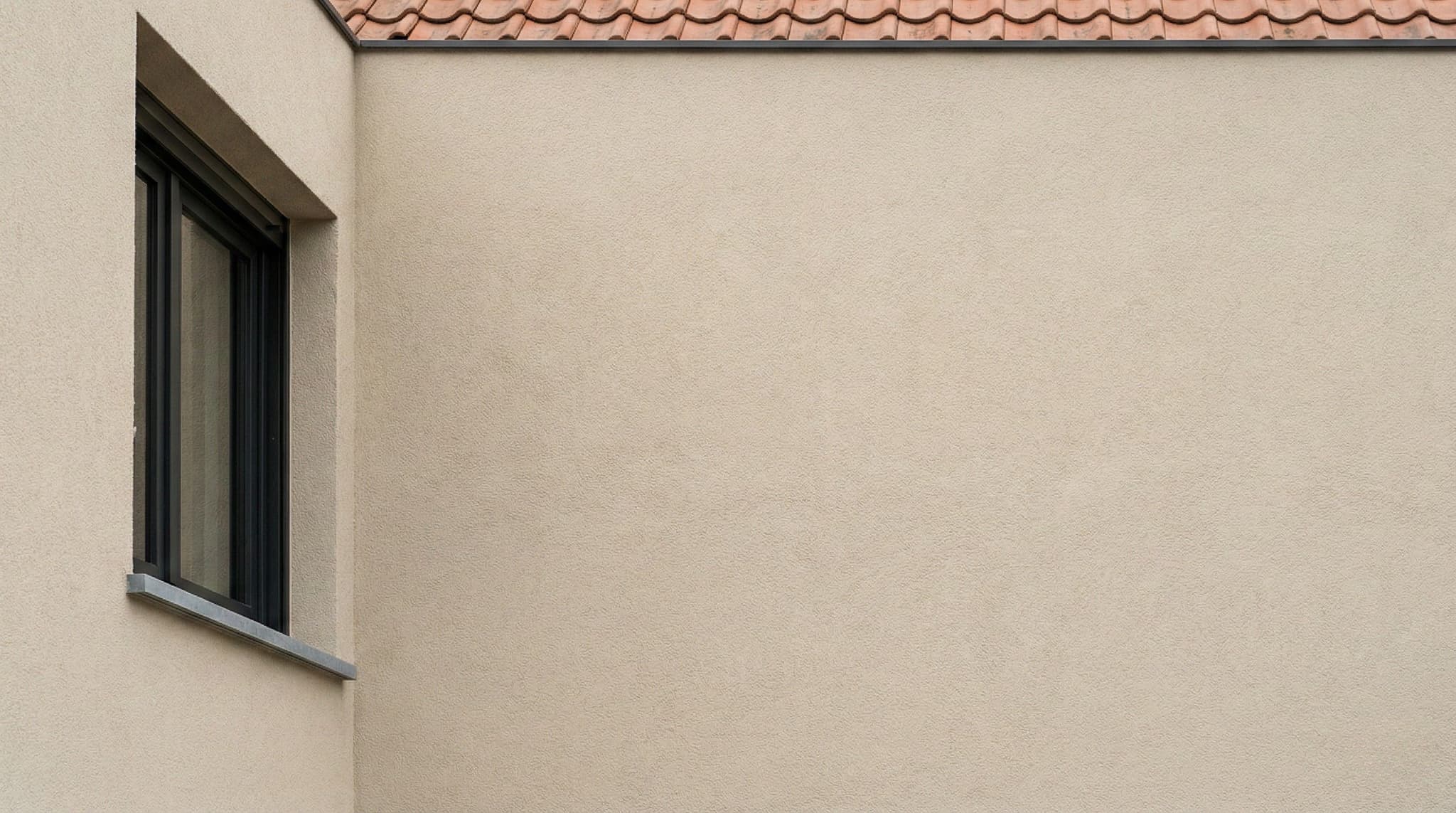 Woning met minerale crepi gevelafwerking - natuurlijke en duurzame uitstraling